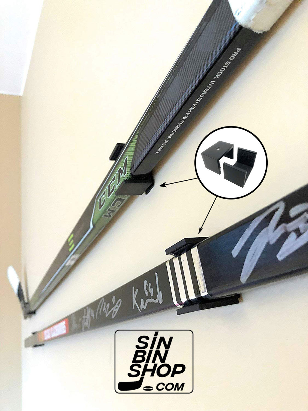 Hockey stick wall display bracket